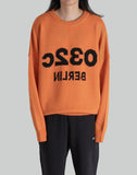 'SAFETY' ORANGE SELFIE SWEATER
