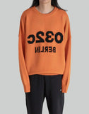 'SAFETY' ORANGE SELFIE SWEATER