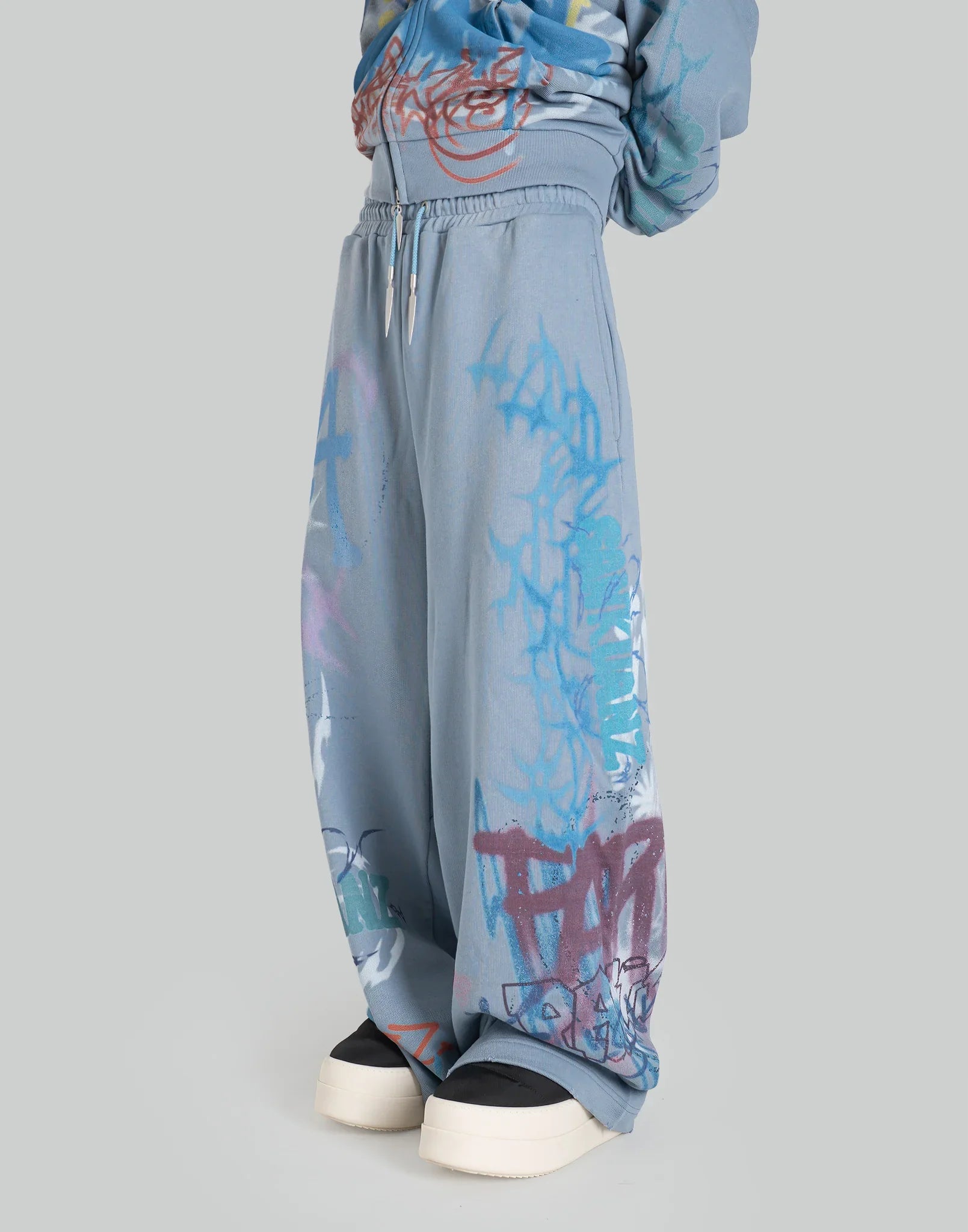 BUMPY GRAFFITI LOOSE SWEATPANTS