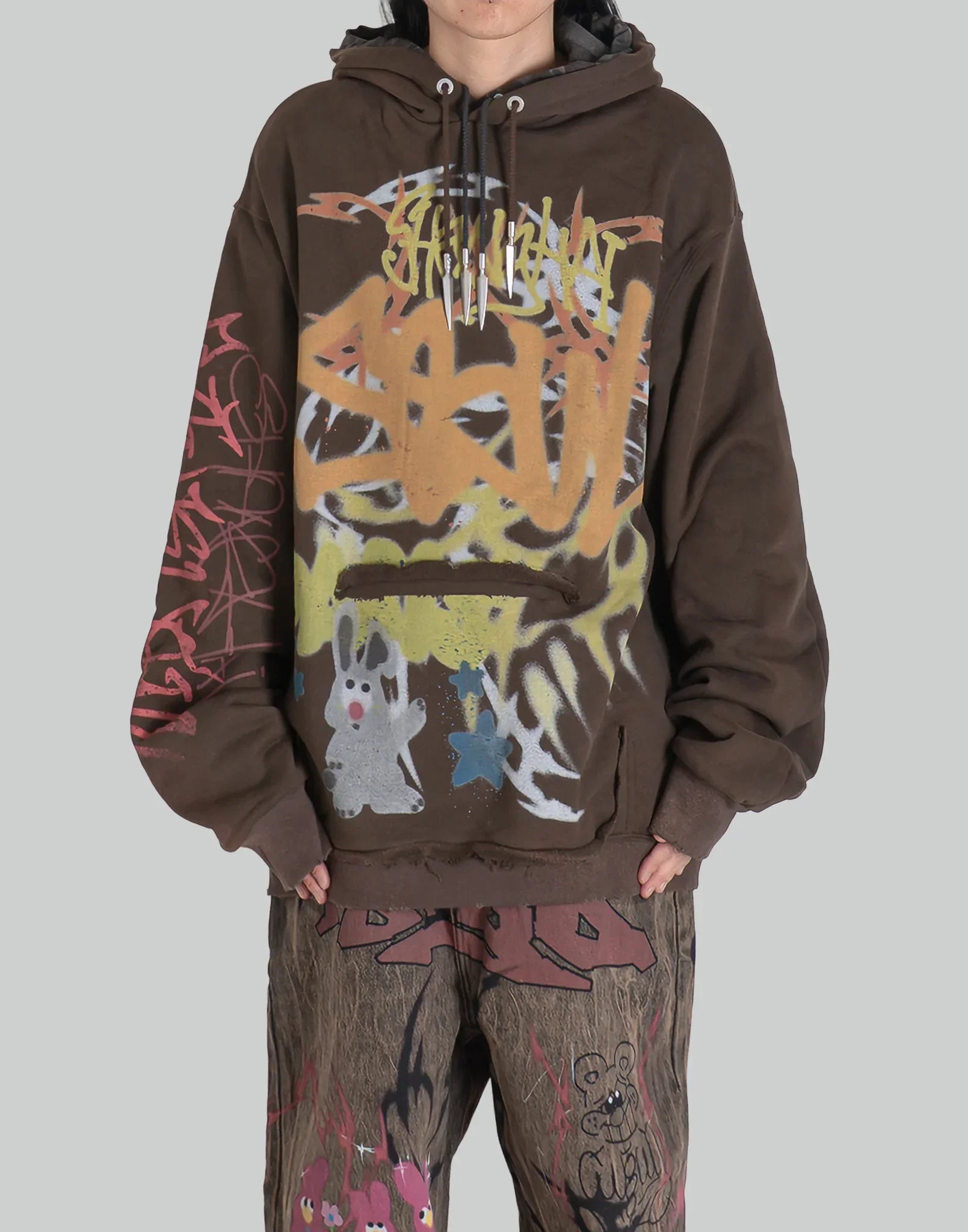 BUMPY GRAFFITI PRINT LAYERED DRAWSTRING HOODIE