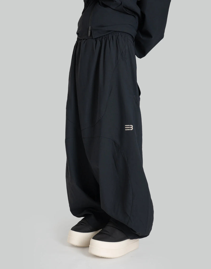 NOMAD TRACK PANTS
