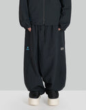 NOMAD TRACK PANTS