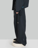 NOMAD TRACK PANTS
