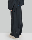 NOMAD TRACK PANTS