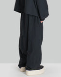 NOMAD TRACK PANTS