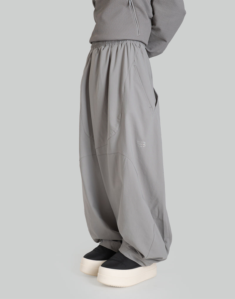 NOMAD TRACK PANTS
