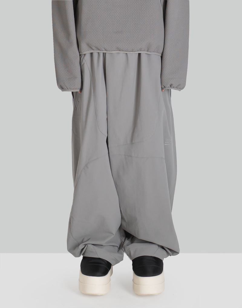 NOMAD TRACK PANTS