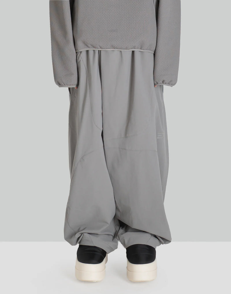 NOMAD TRACK PANTS