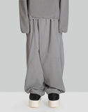 NOMAD TRACK PANTS