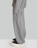 NOMAD TRACK PANTS