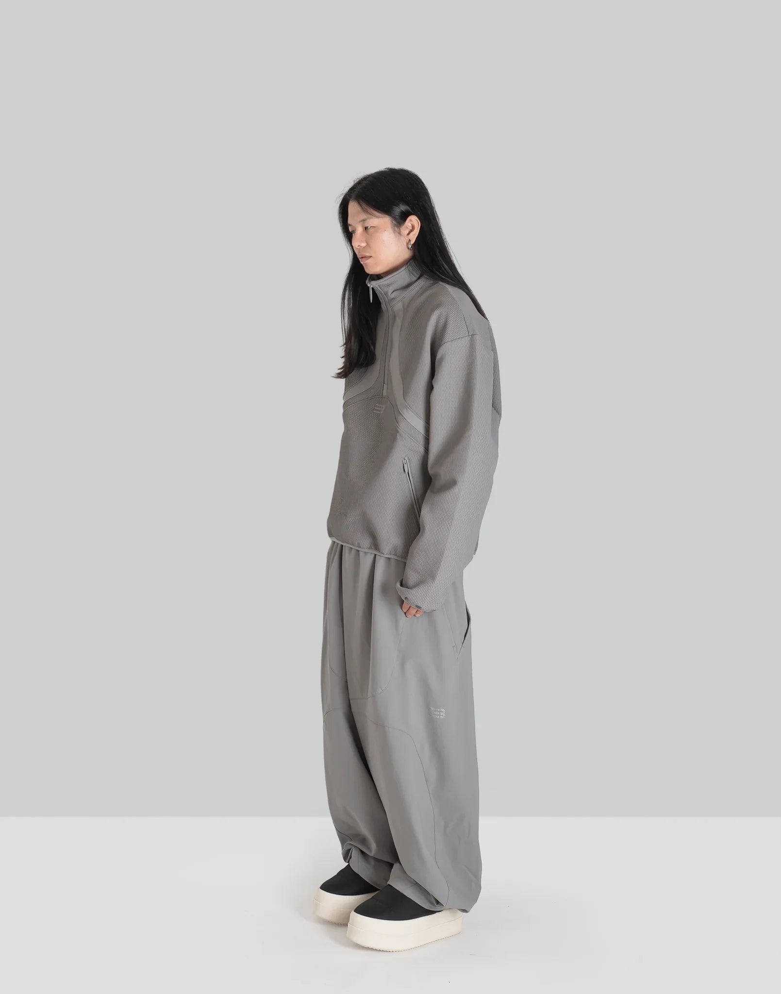 NOMAD TRACK PANTS