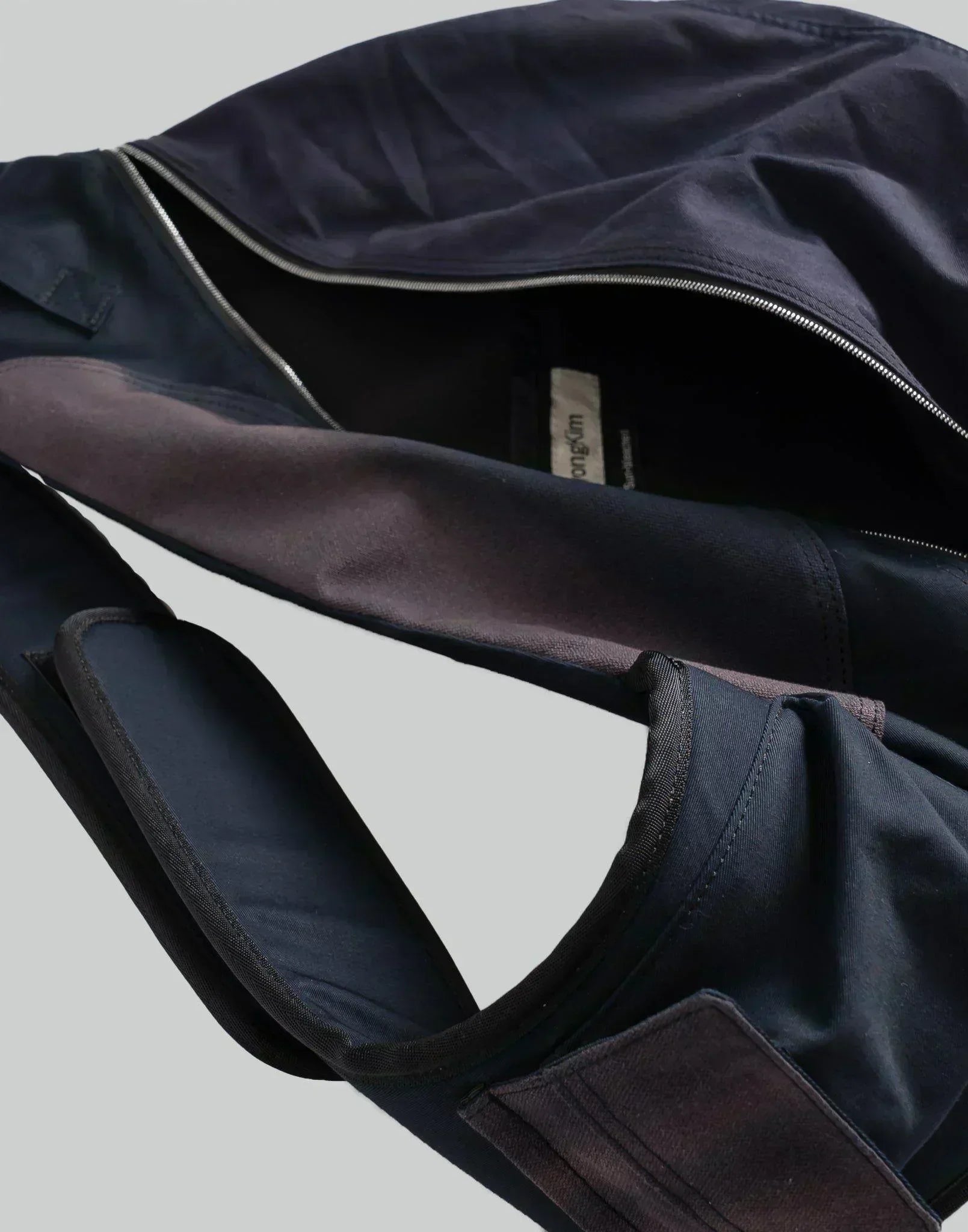 JiyongKim - SUN-BLEACHED PATCHWORKED SLING BAG - 082plus