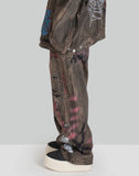 BUMPY GRAFFITI PRINT DISTRESSED DENIM PANTS