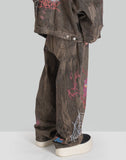 BUMPY GRAFFITI PRINT DISTRESSED DENIM PANTS
