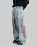 GRAFFITI PRINT DENIM PANTS